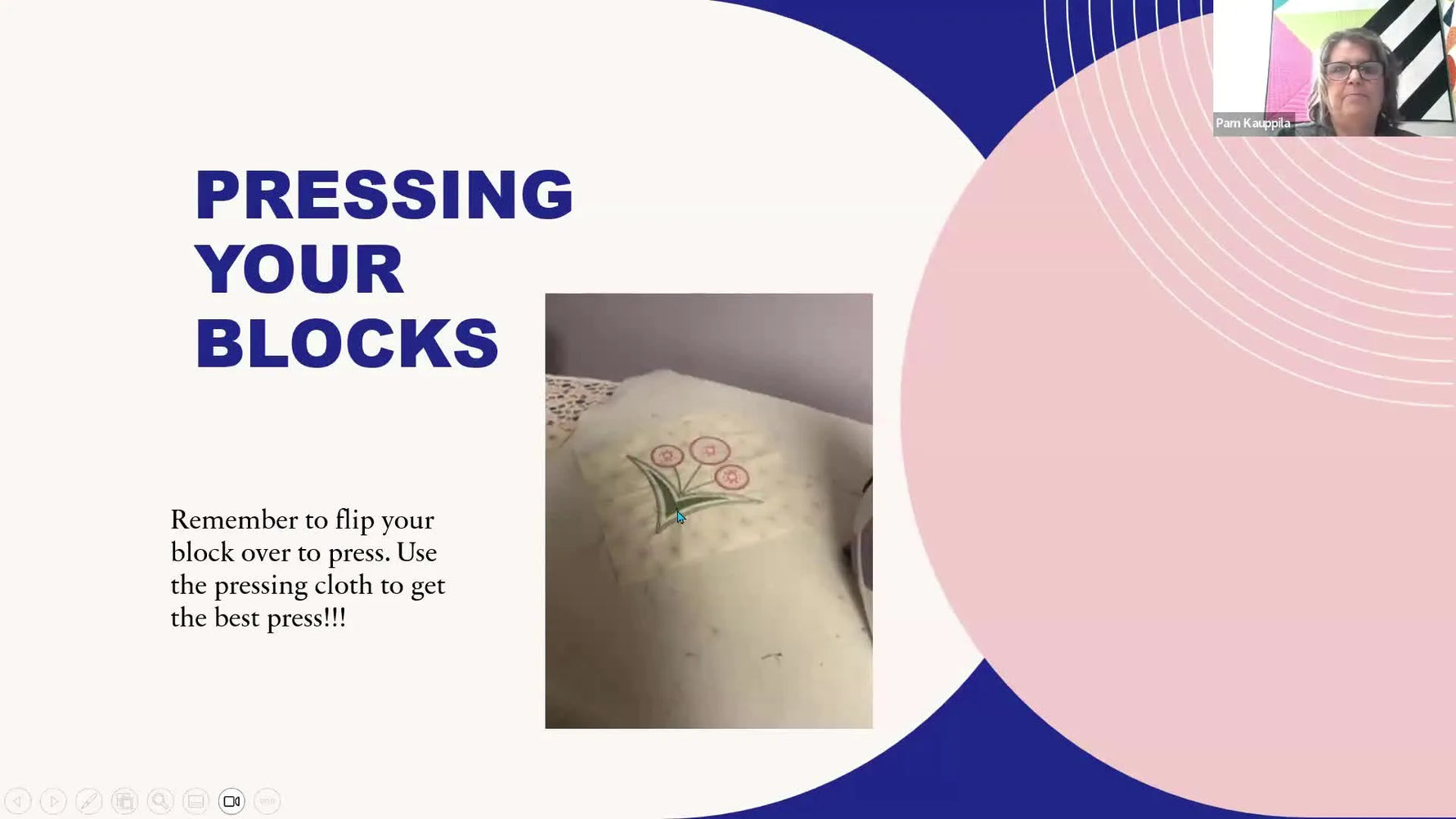 A slide shows the manual centering method for a quilt block using a plastic embroidery hoop on a blue grid mat.