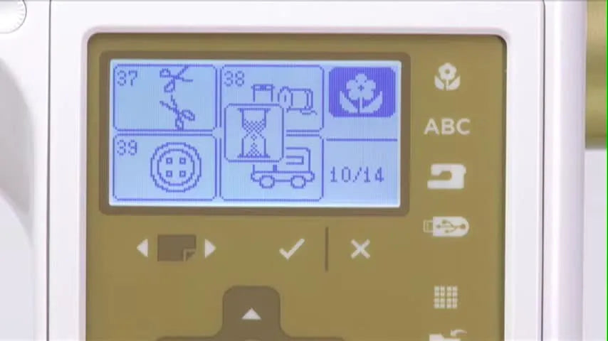 The Singer Studio LCD detail screen for Design 40 shows the truck motif with stitch area, color count, and estimated sewing time.