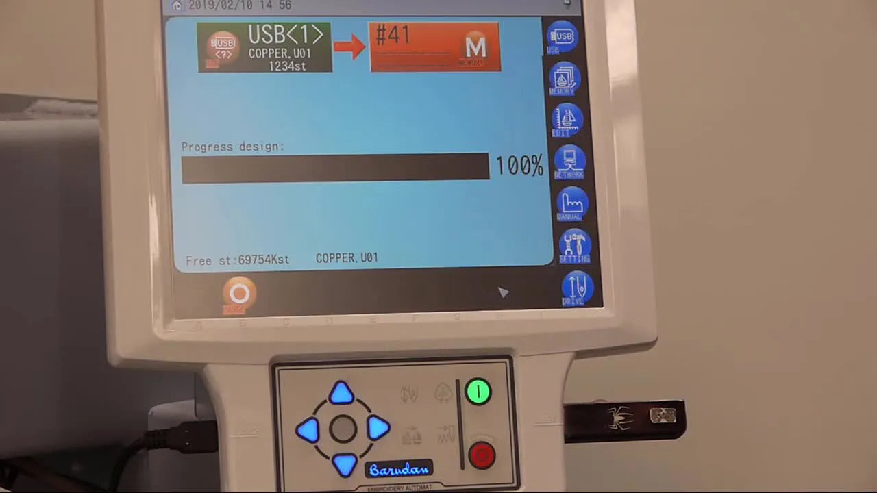 The Barudan control panel displays the COPPER design fully loaded in realistic stitch view, confirming a successful USB-to-memory transfer.