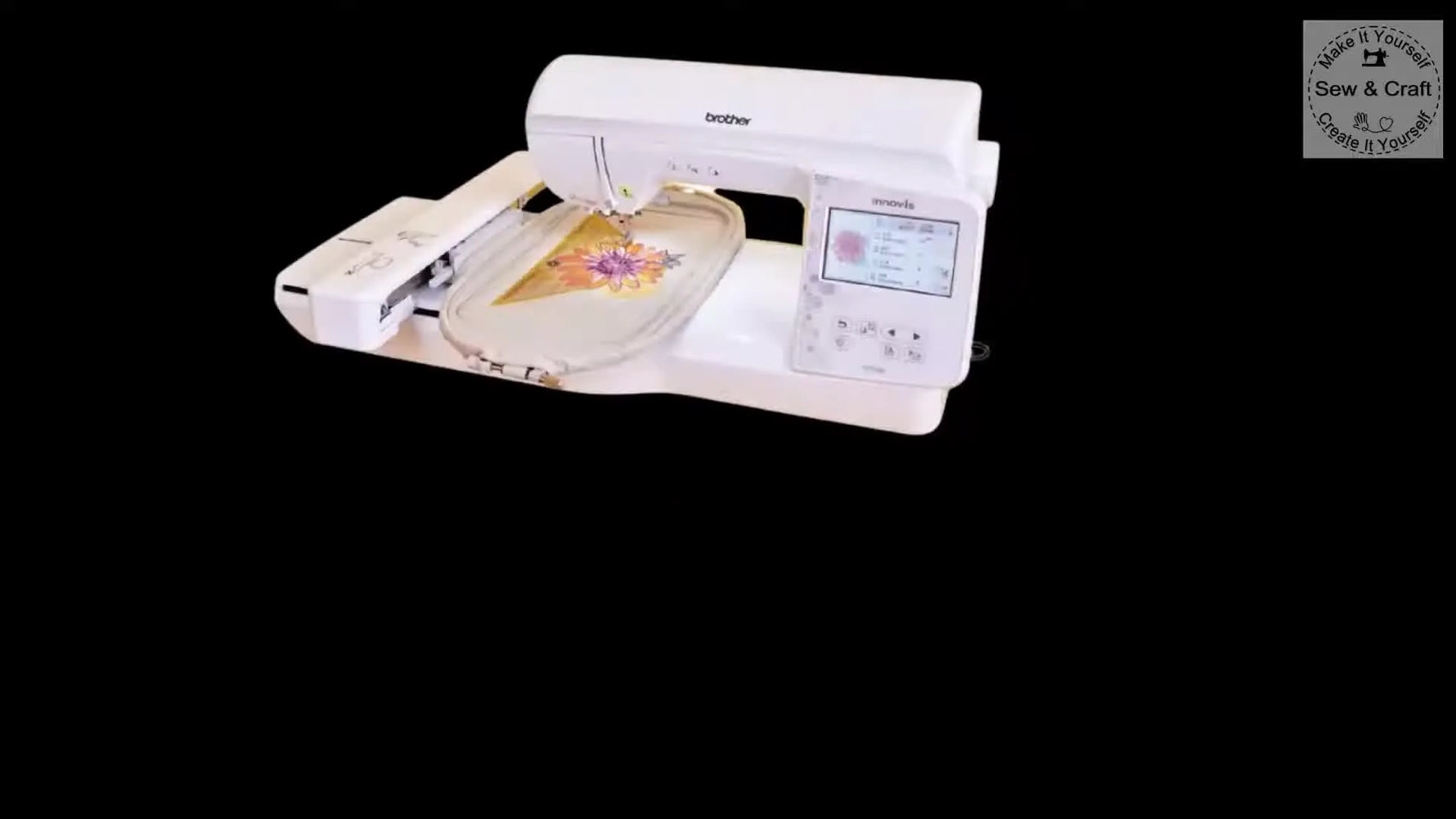 A Brother NV880E embroidery machine sits ready with a floral design hooped and visible on the screen.