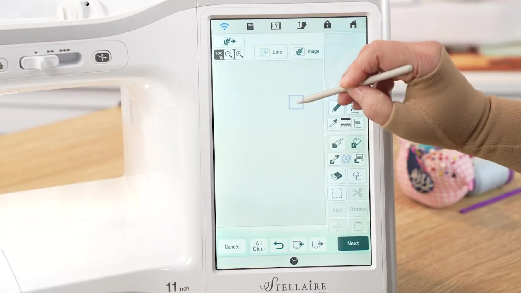 A My Design Center screen capture showing the Paint Bucket applying a cross-hatch fill between the stamp outline and a square frame.