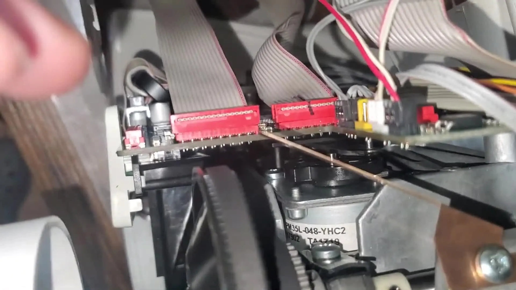 A close-up view of the Emerald 183 main electronic circuit board showing the connector layout used for reassembly checks.