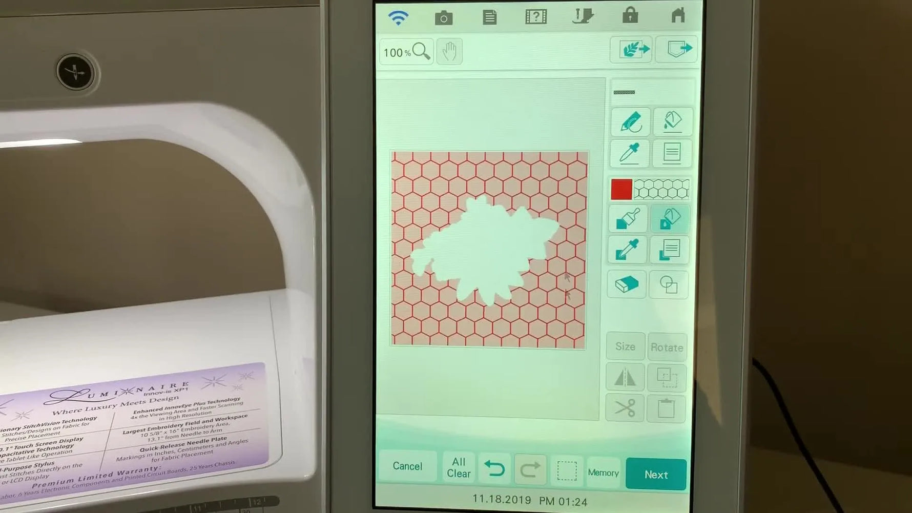 The Brother Luminaire screen shows a red honeycomb background fill neatly surrounding a floral outline after using the Bucket tool in My Design Center.