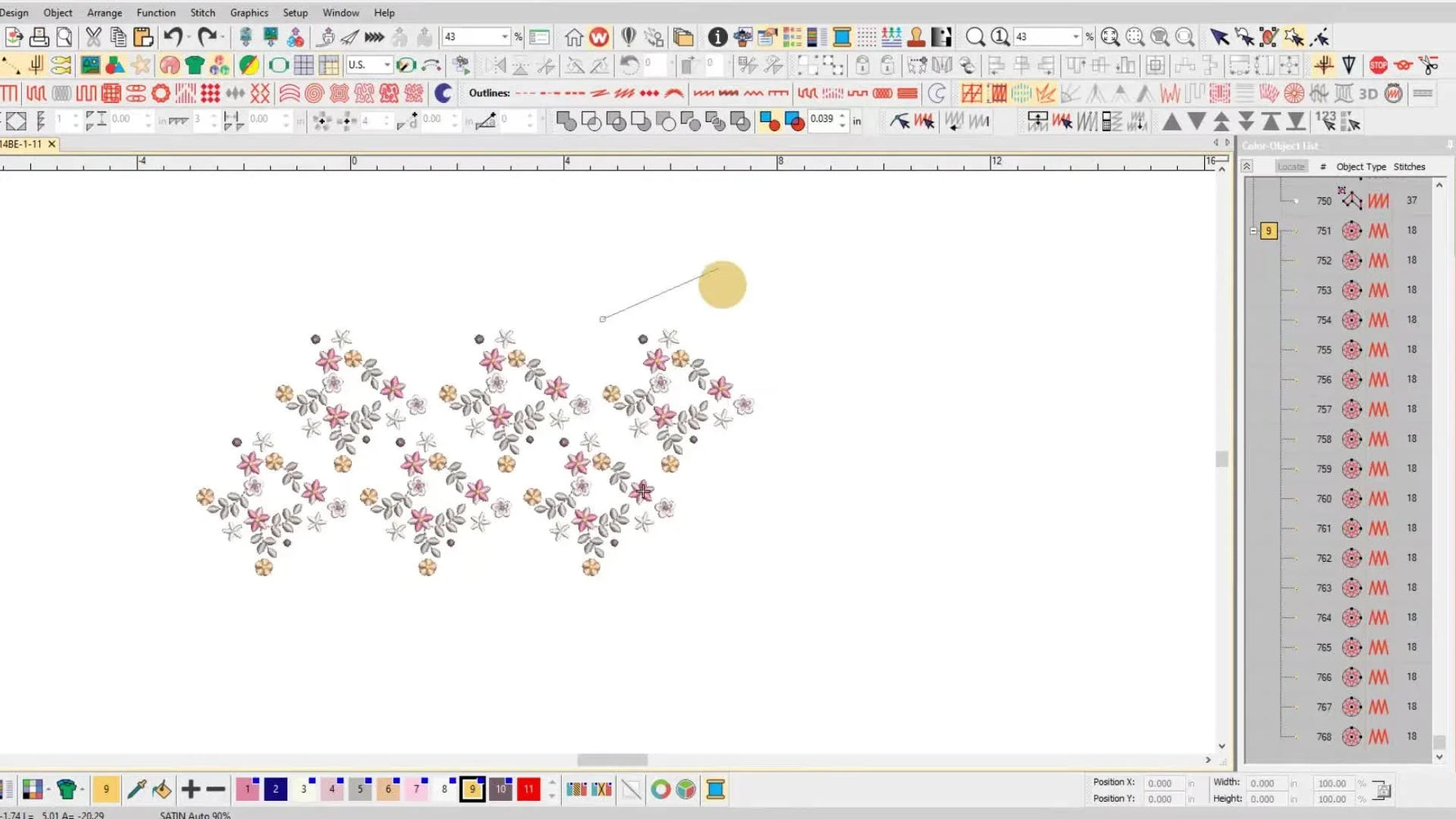An overhead view of the finished embroidered-fabric panel stitched on mauve satin silk dupion while still hooped with stabilizer.
