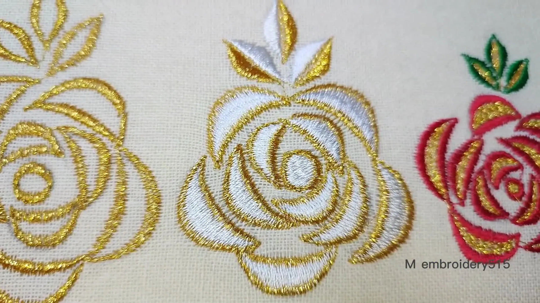 All five completed machine embroidered roses in various colors and techniques.