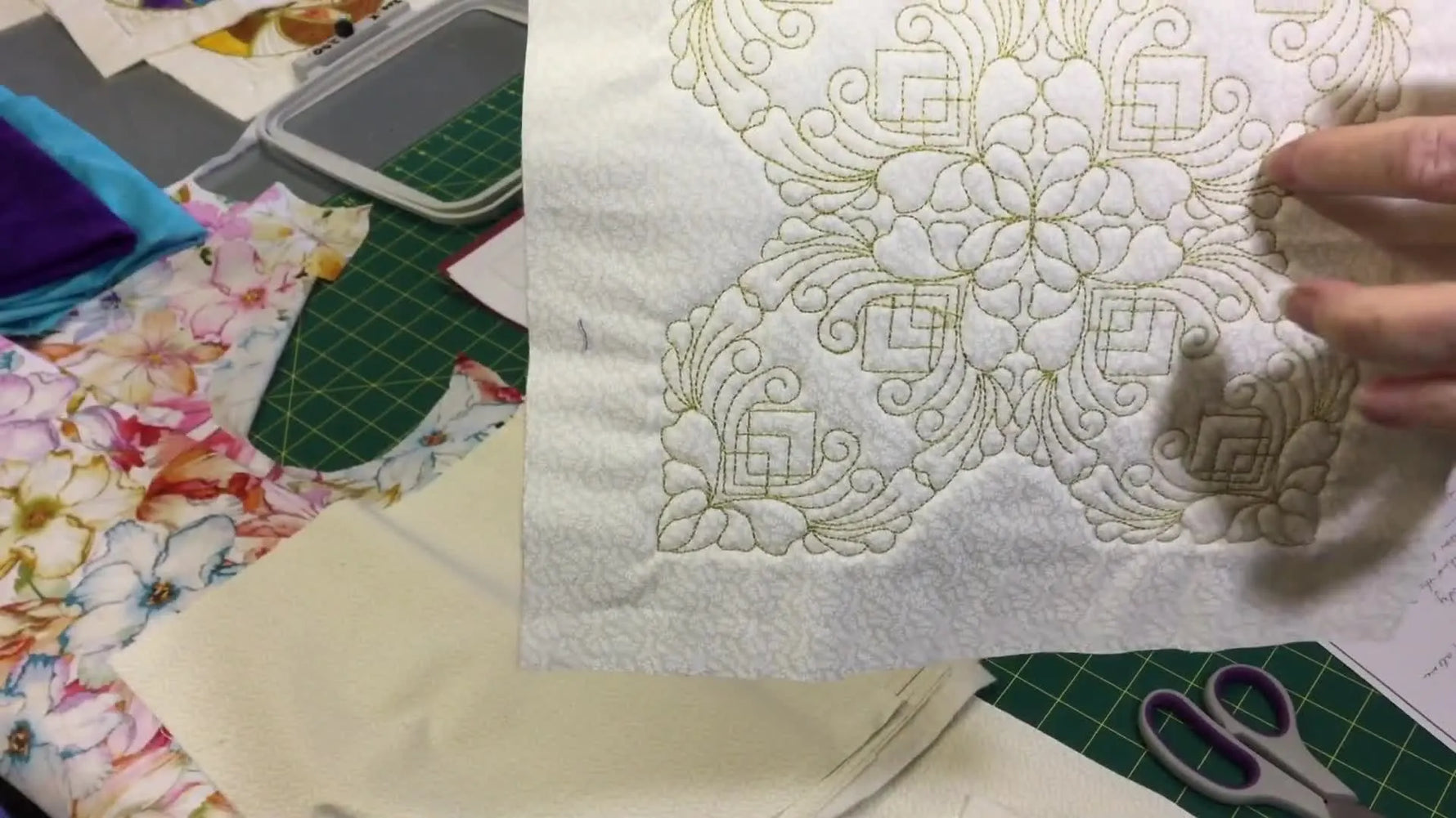 Close-up of the front of a finished embroidered dragonfly block.