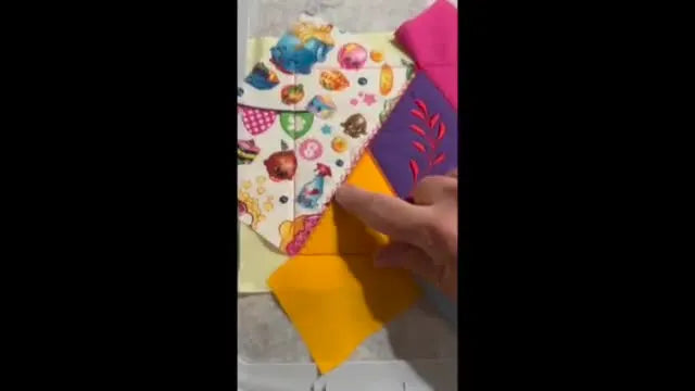 Close-up of the finished ITH crazy quilt block with decorative motif stitching covering the seam lines.