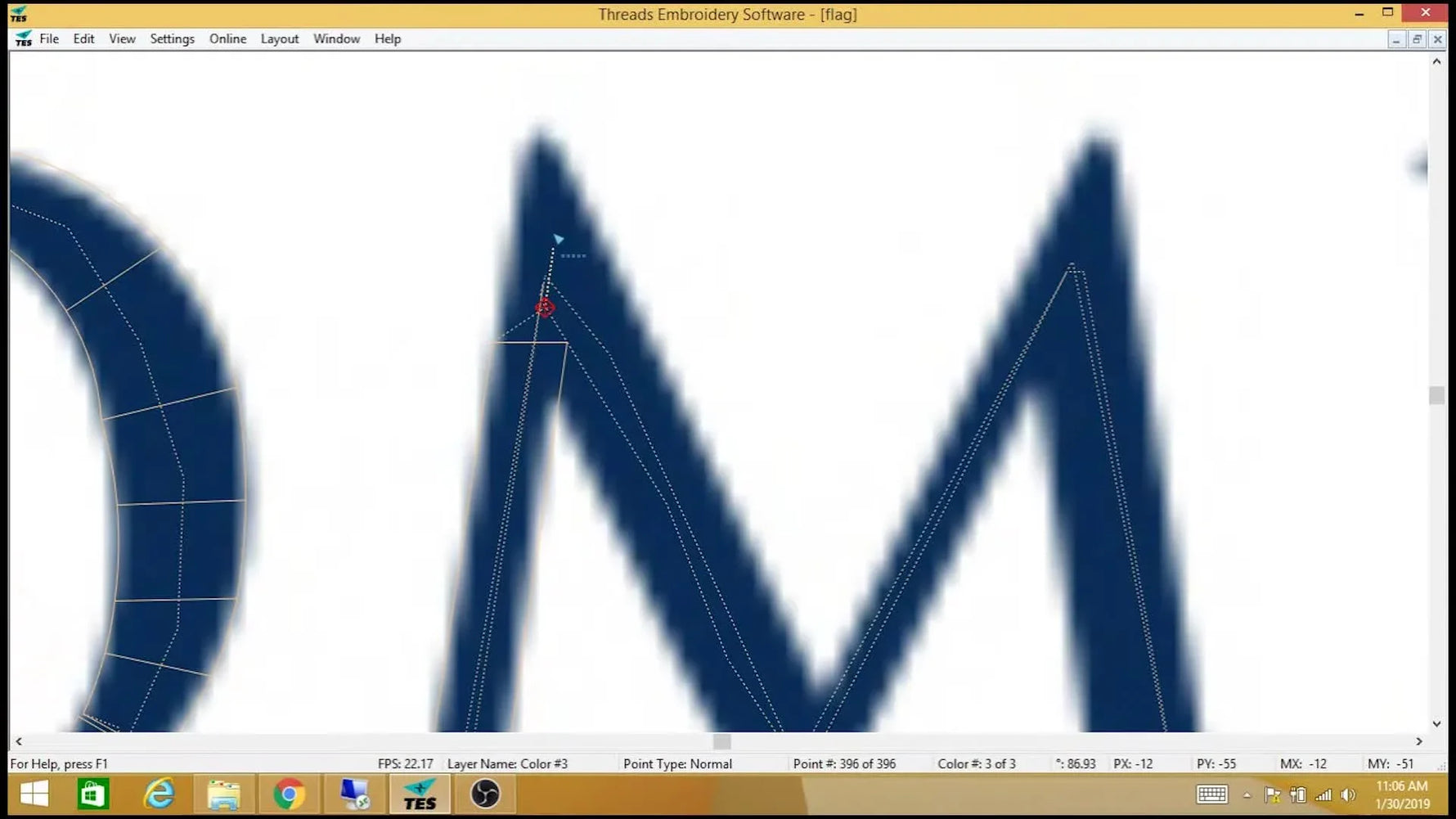 A screen capture of Threads Embroidery Software showing the letter “M” fully digitized in blue wireframe at the top peak, ready for stitch preview.