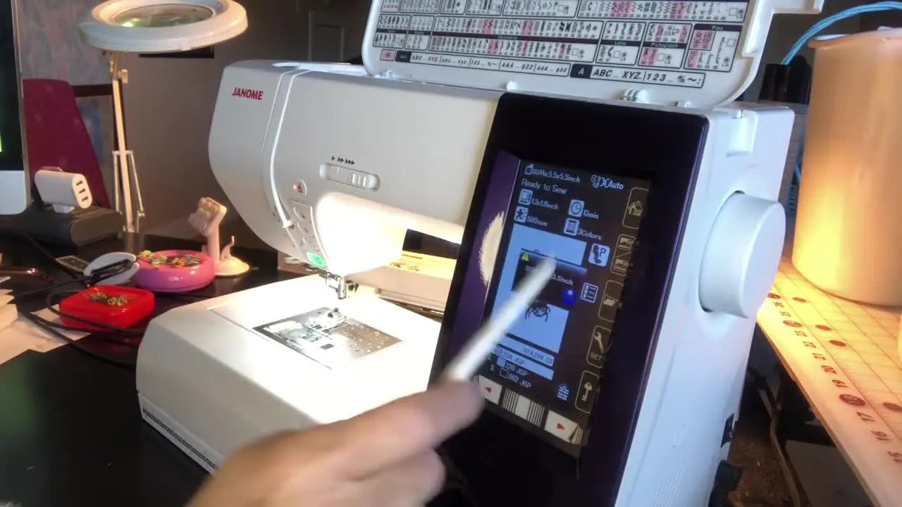Janome machine touchscreen displaying the 'Bee 2' embroidery design