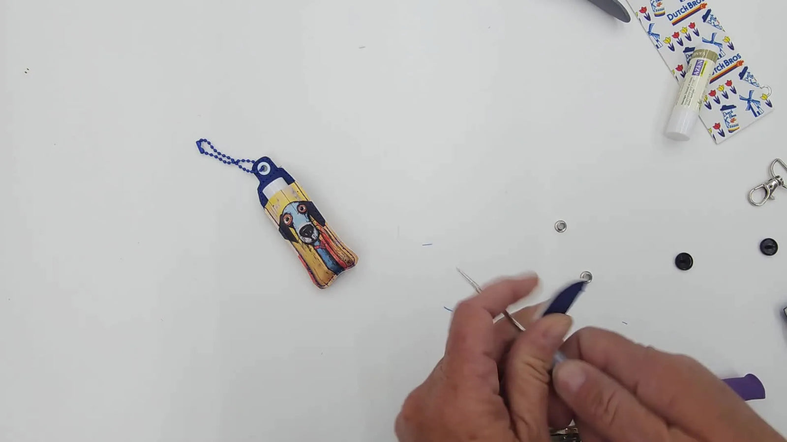 Two-Step ITH Lip Balm Holders on a Brother 5x7 Hoop: Snap Tab vs Eyelet (and the Tape Trick That Saves Your Stitch-Out)