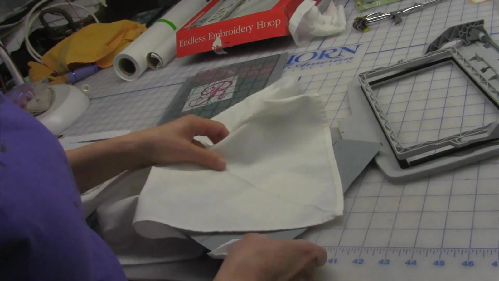 Stop Re-Hooping Every Napkin: The Endless Hoop “Window Template” Trick for Perfect Corner Placement