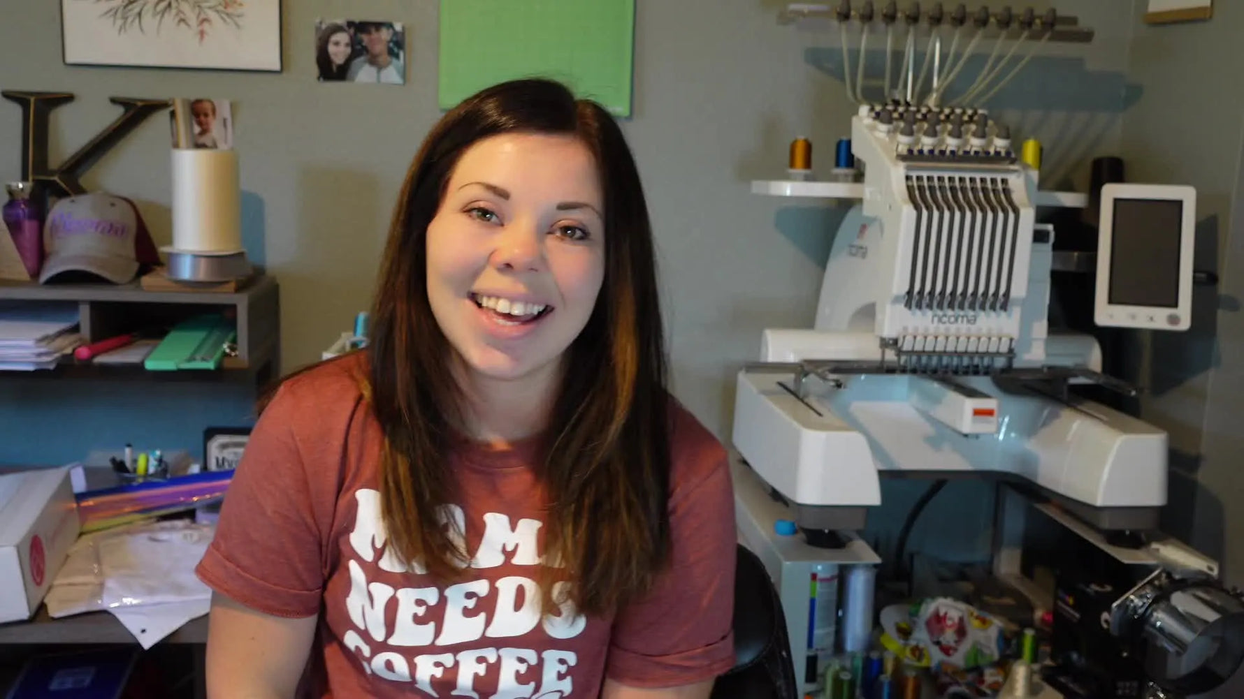 Kayla introducing the video with her multi-needle embroidery machine in the background.