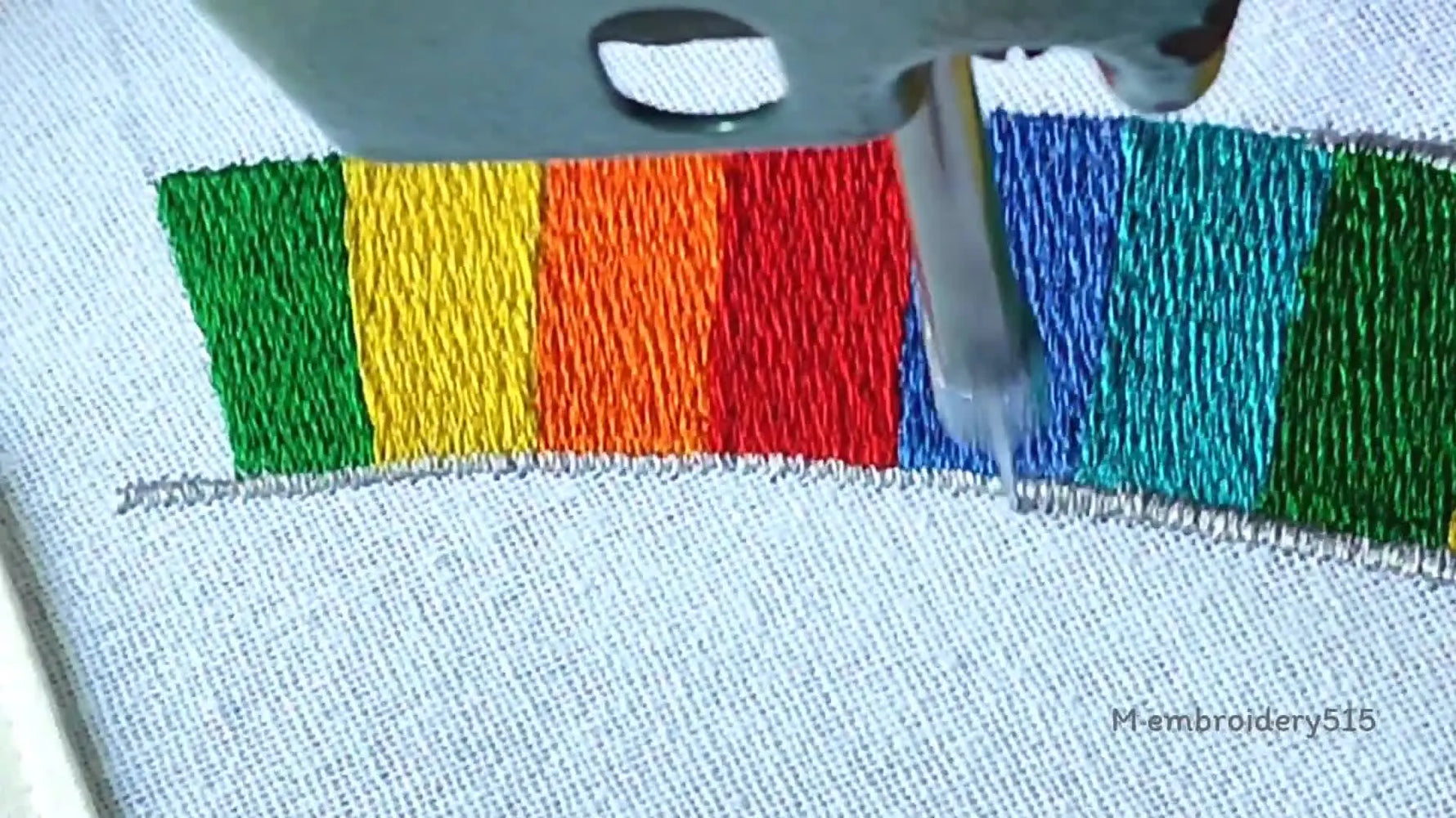 Silver thread stitching the outer border