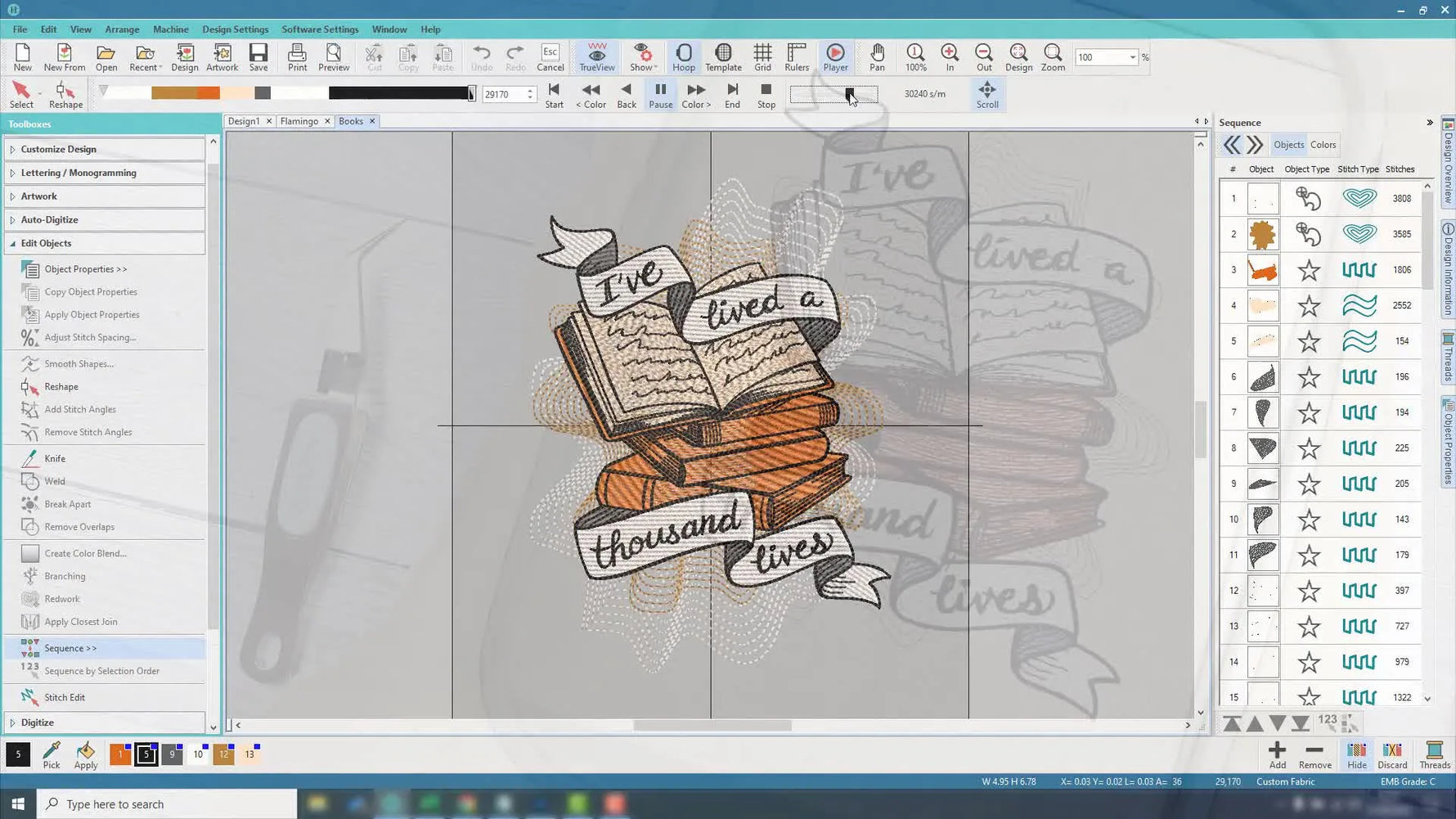 The finished machine embroidered design on fabric, with all fill stitches.