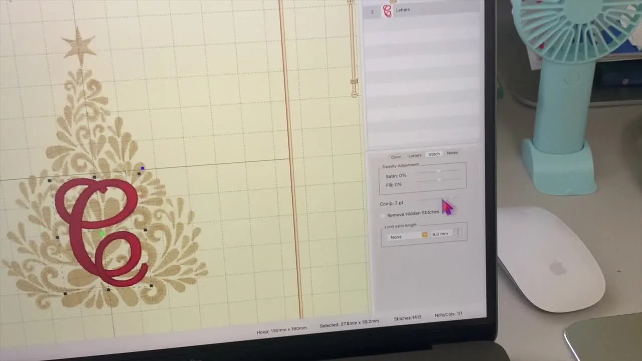 A screen capture shows the monogram letter “C” visibly thicker after increasing the Comp setting in Embrilliance.