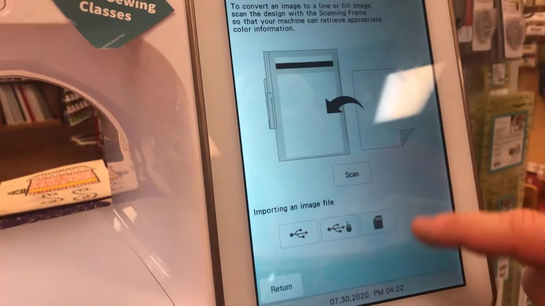 The Baby Lock Solaris screen shows the Image Scan prompt in IQ Designer, ready to capture the hooped fabric for precise placement.