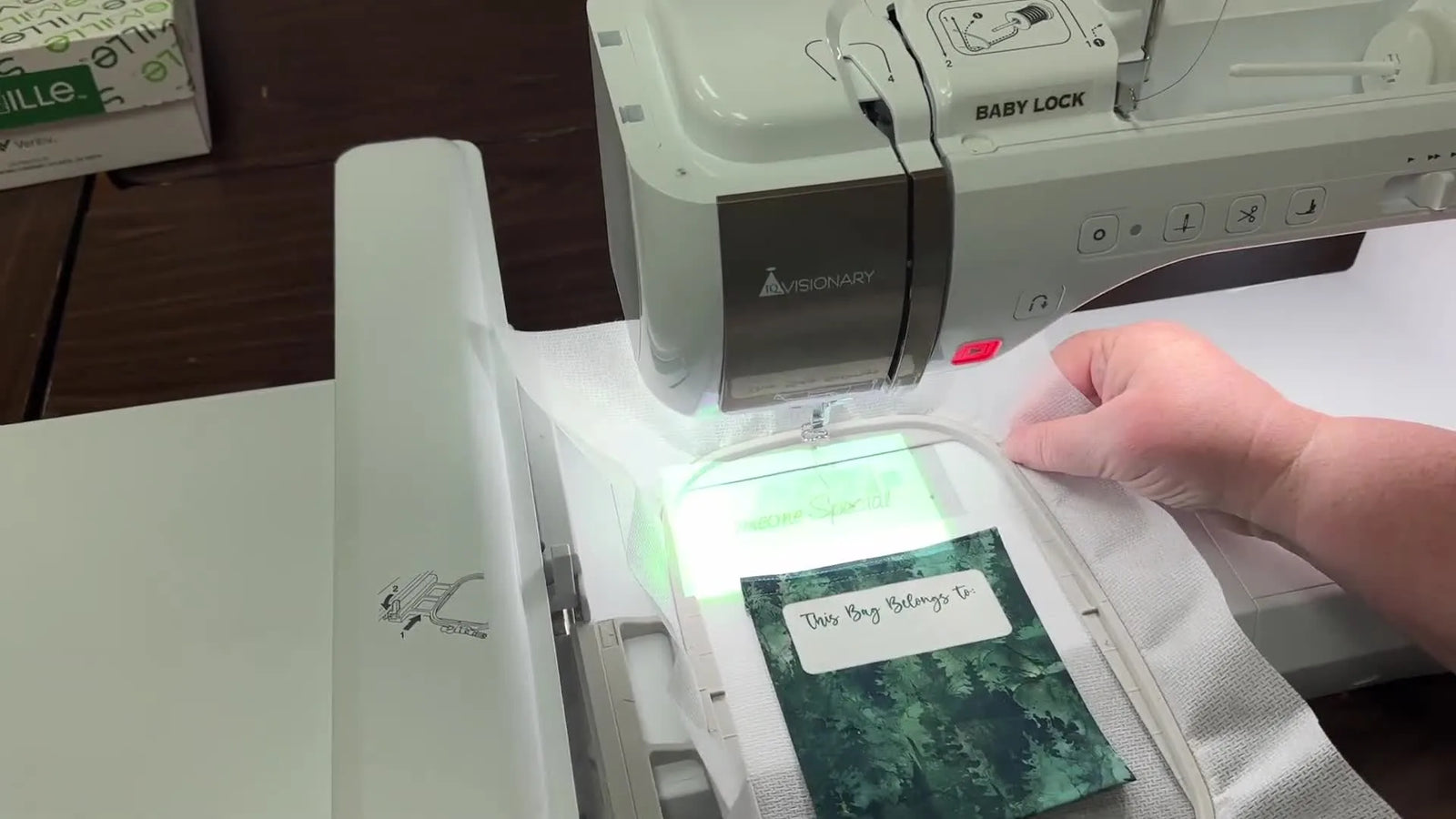 Nail Text Placement on the Baby Lock Solaris Vision Projector—Even on Tiny Pockets (Without Hooping the Fabric)
