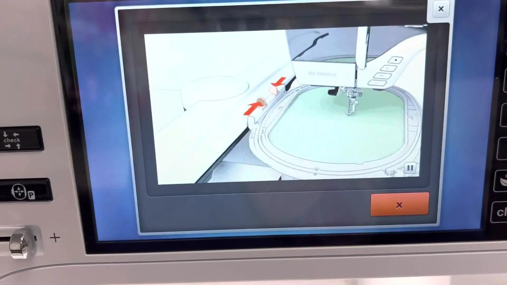 The Bernina B 700 screen displays the red-arrow prompt indicating it’s time to attach the hoop.