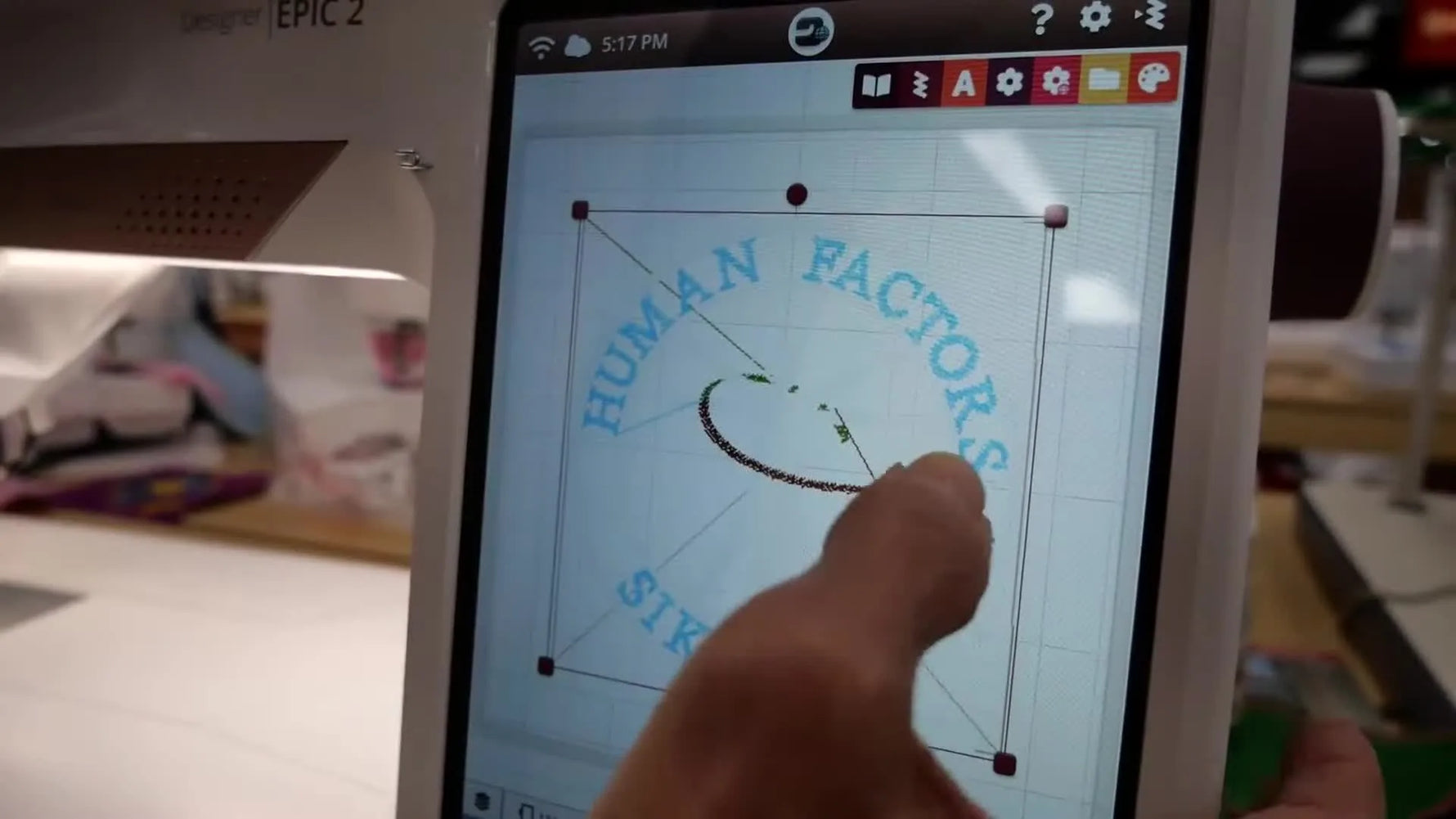 A Husqvarna Viking Designer EPIC 2 screen shows a patch design correctly loaded inside the hoop grid, ready to stitch.