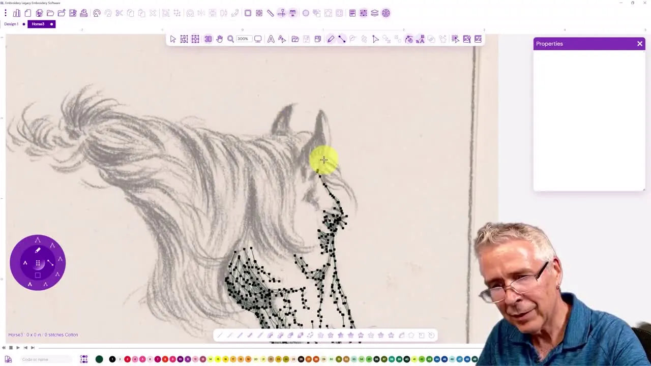 A close-up of the finished horse-head sketch embroidery stitched in black thread on stabilizer, showing the hand-drawn run-stitch effect.