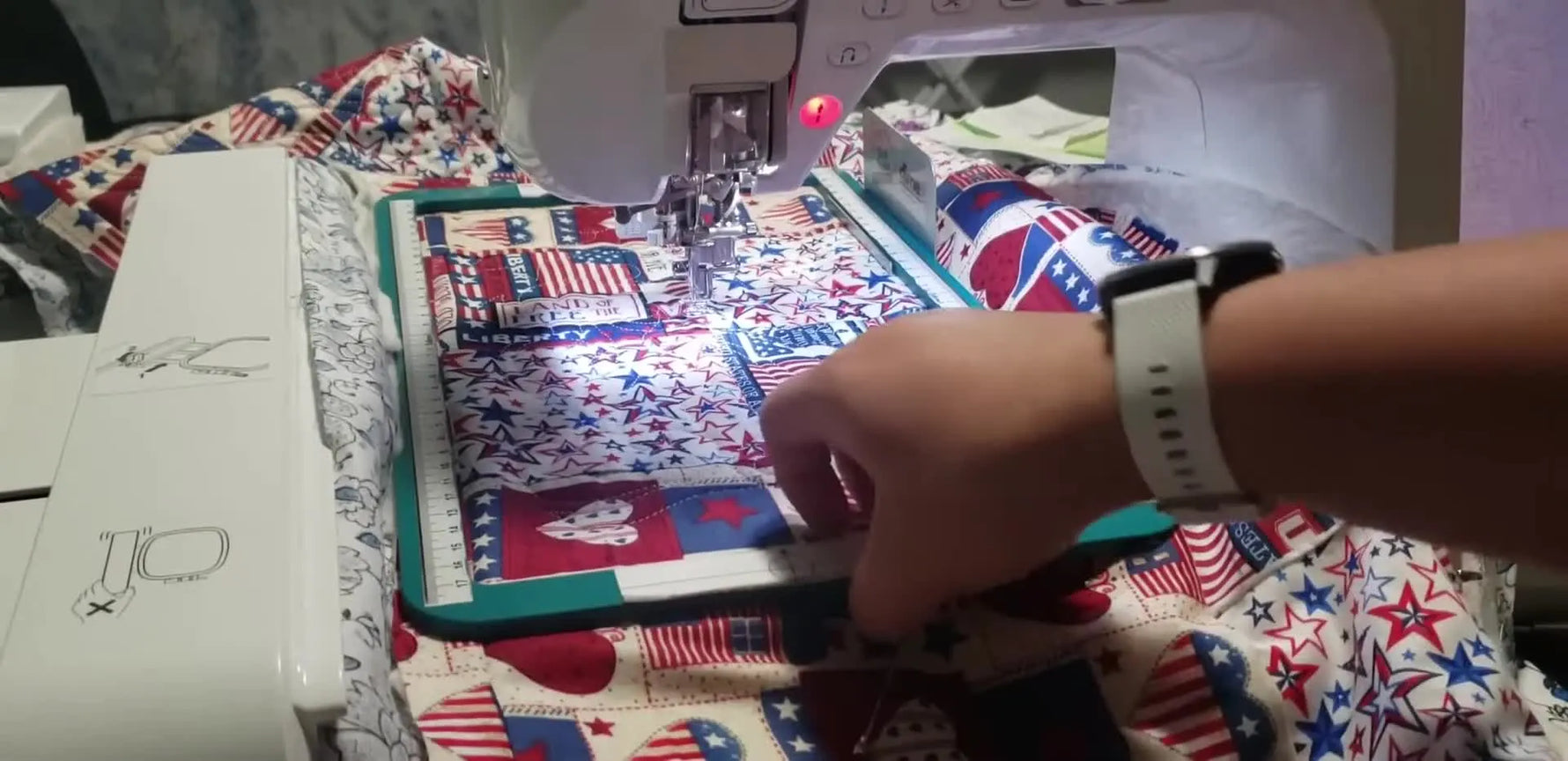 A close view of the top magnetic frame being lifted off the quilt sandwich to advance the project for the next edge-to-edge quilting block.