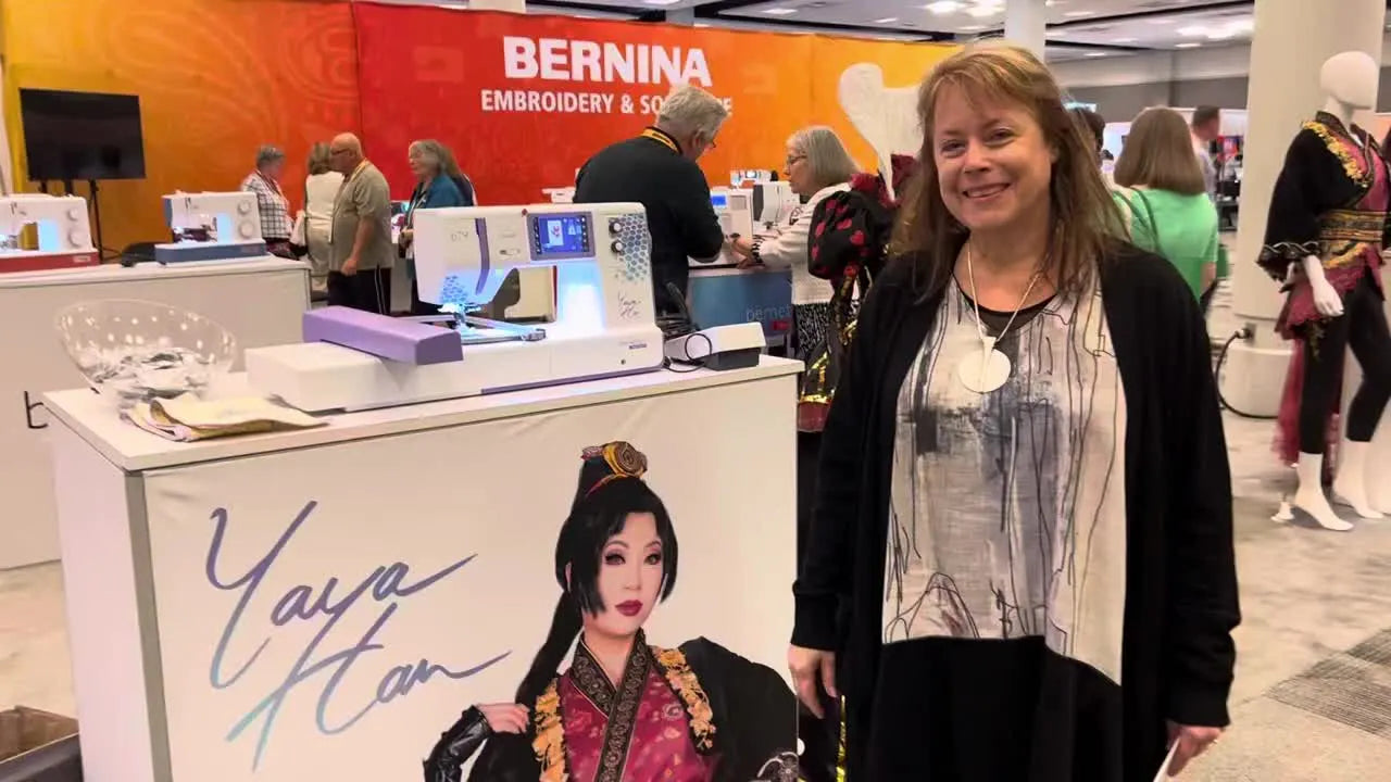 A full view of the Bernette 79 Yaya Han Edition with the embroidery module attached, shown on display at Bernina University.