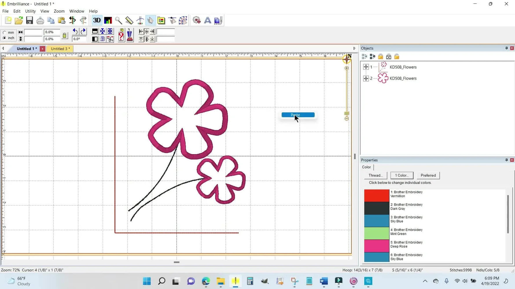 A merged bow design sits on top of the original Kimberbell flower layout inside Embrilliance Essentials, showing a successful copy-and-merge workflow.