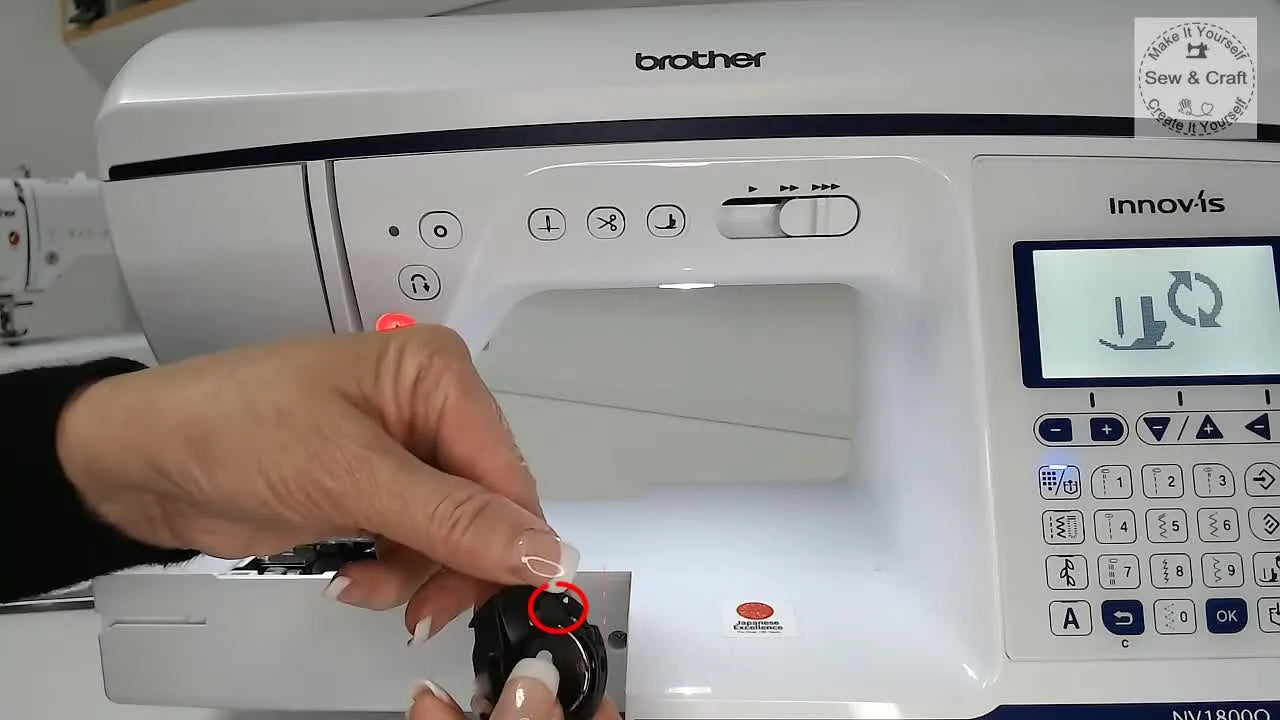 A close-up shows the white arrow on the Brother bobbin case aligned precisely with the white dot on the machine frame for correct reinstallation.