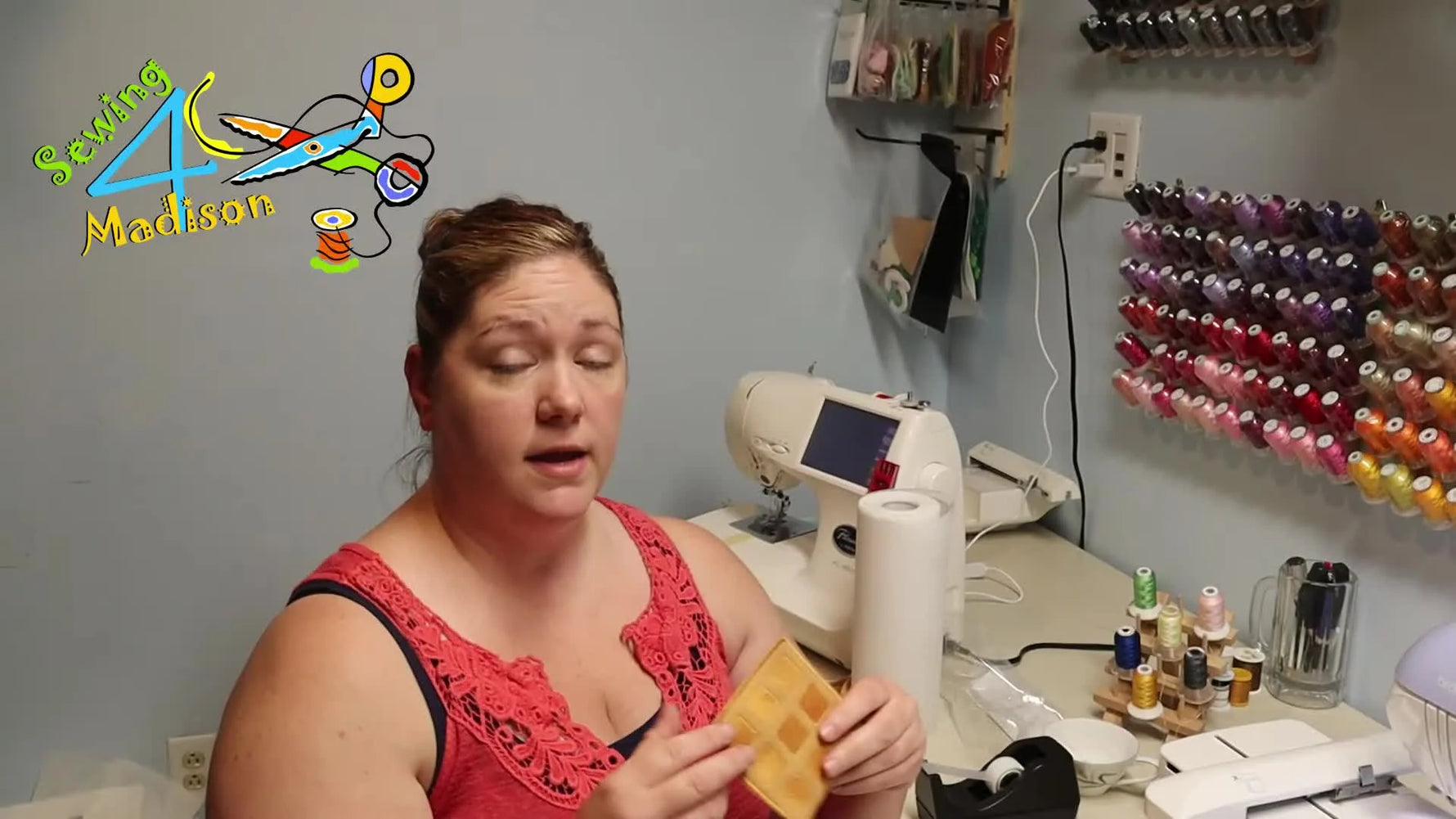 A finished reversible felt waffle is held up to show the stitched texture and clean edges on both sides.