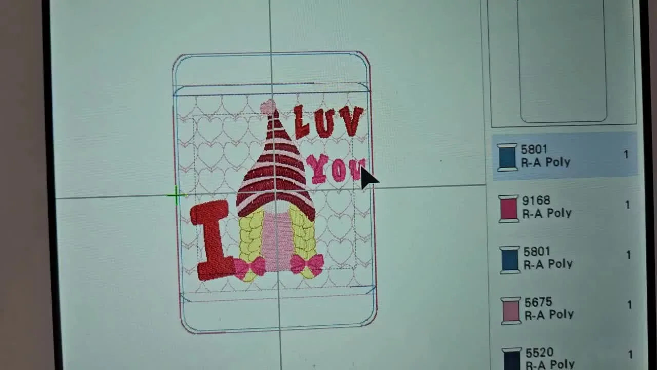 A machine screen preview of the finished Girl Gnome “I Luv You” ITH mug rug design before stitching begins.