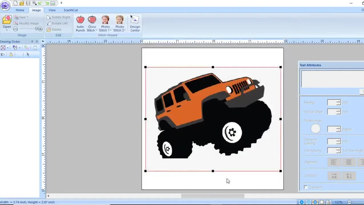 A finished Auto Punch–digitized Jeep design sits on the software workspace grid, ready to be saved and stitched.