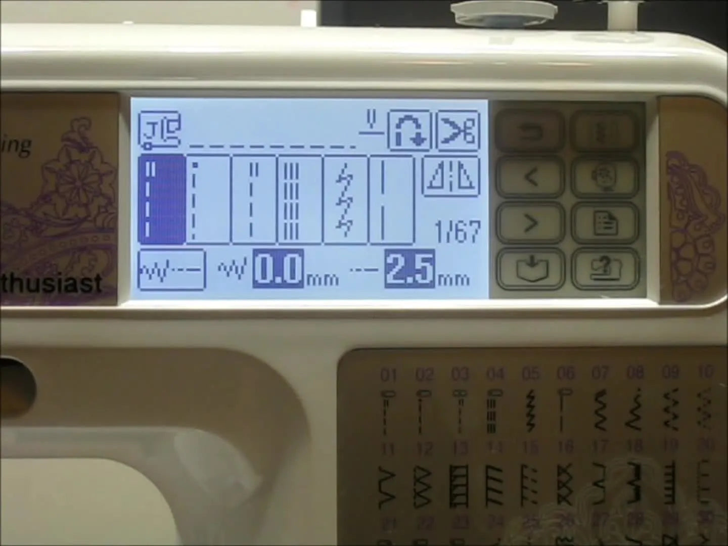 A close-up of a finger pressing the Brother SE400’s physical Embroidery mode button to enter the embroidery interface.