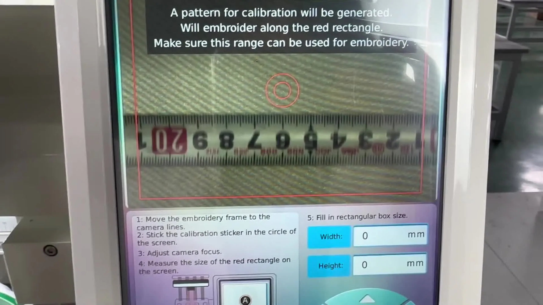 A close-up of the YunFu control panel camera feed showing a metal ruler perfectly aligned inside the red calibration rectangle overlay.