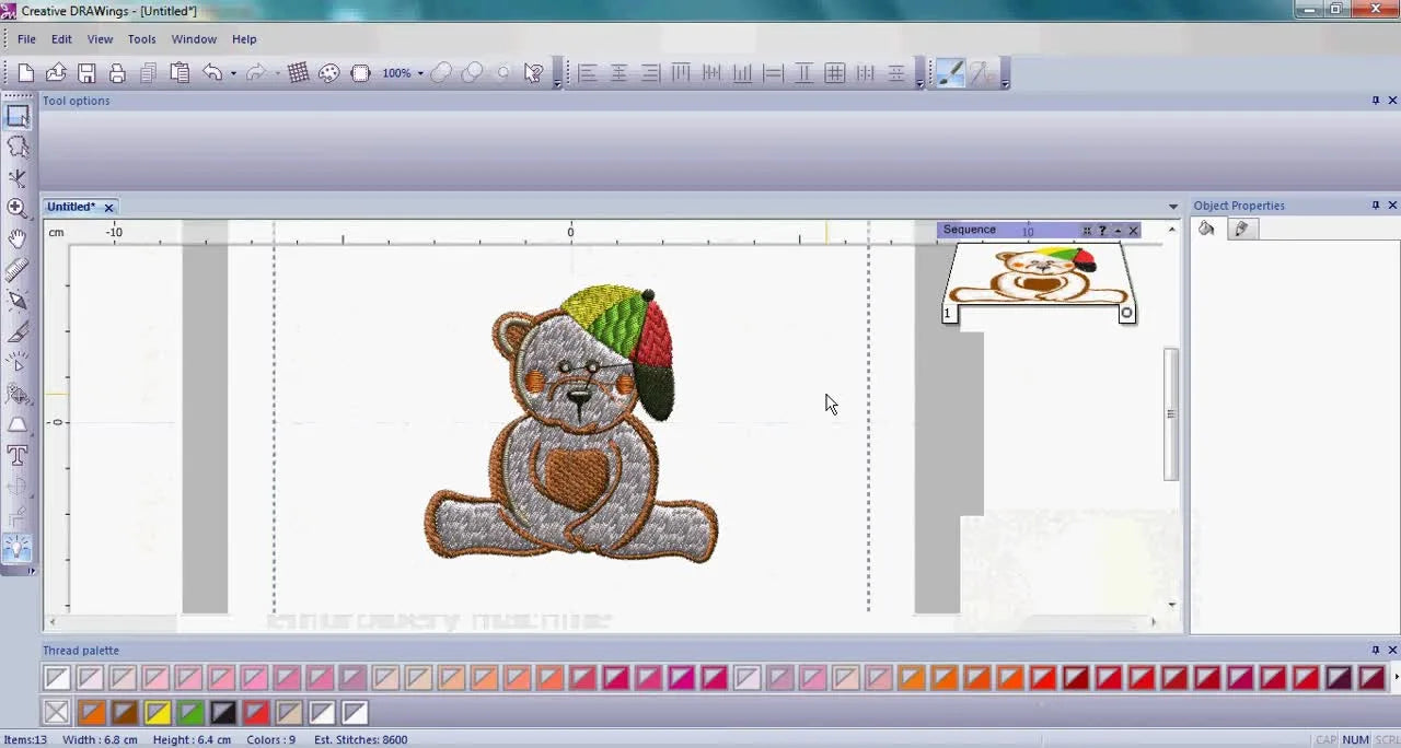 A full-screen view of the Creative DRAWings interface with the teddy bear design loaded and the thread palette visible for color editing.