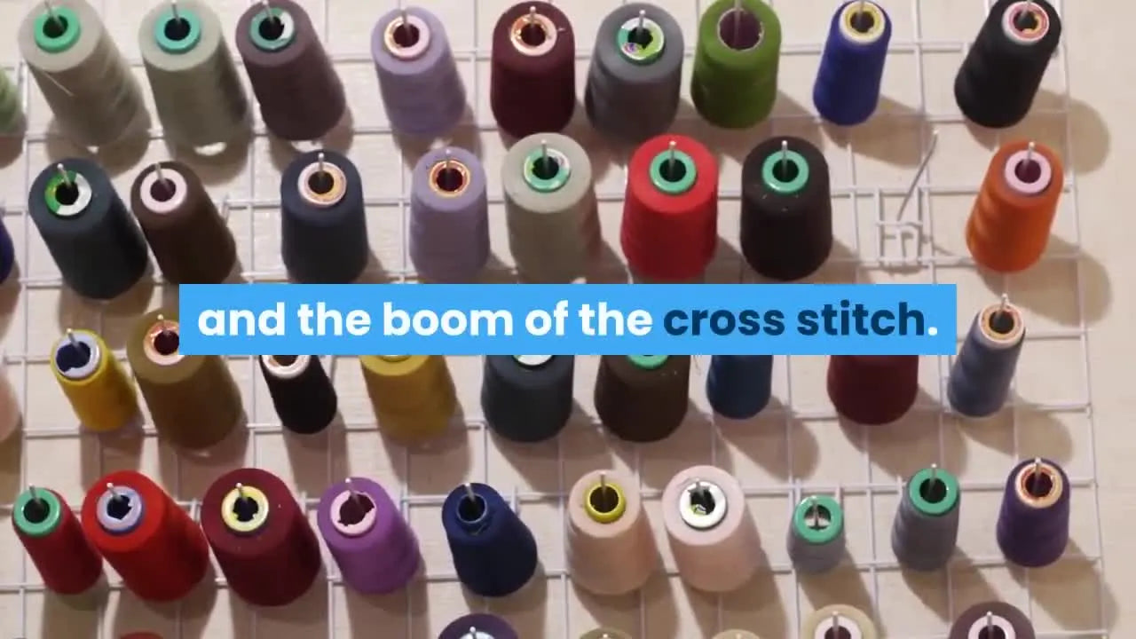 A long row of industrial multi-head embroidery machines running garments in a production line, showing what modern embroidery scalability looks like.