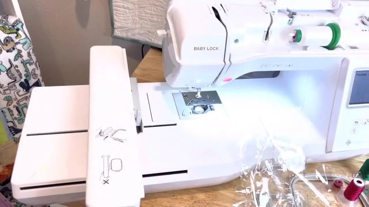 A finished see-through snowglobe charm is shown close-up with a neatly installed eyelet, ready to be turned into a key fob or ornament.