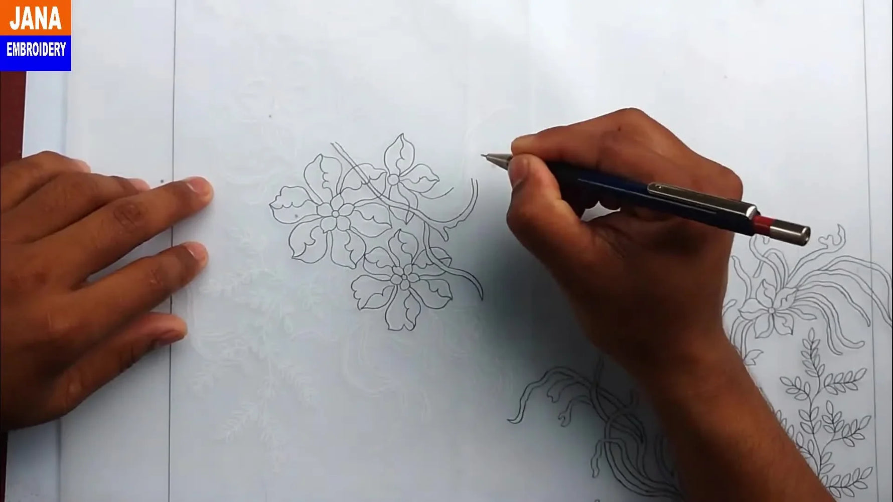 Hand meticulously tracing intricate details of a central leaf cluster with a mechanical pencil.