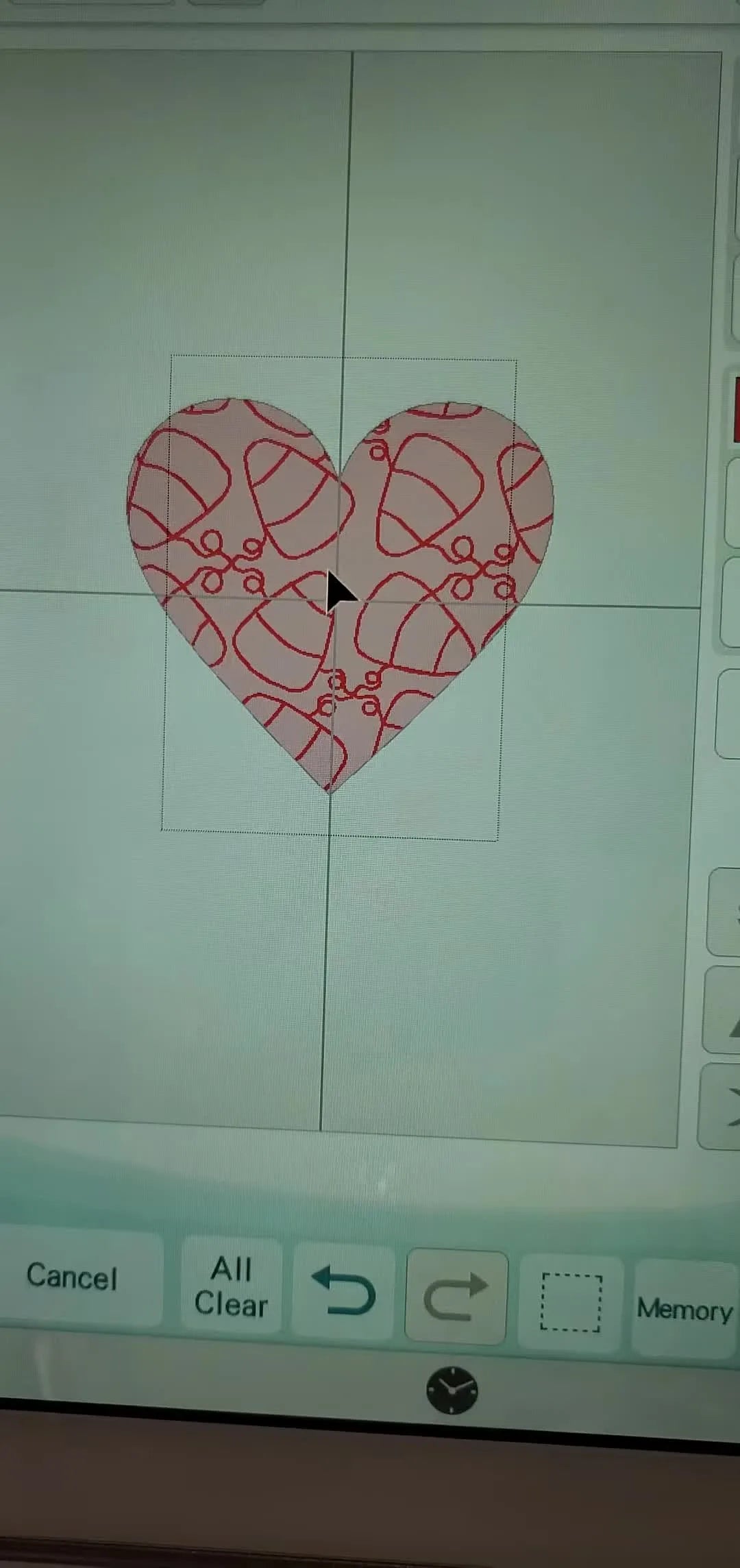 A heart shape in Baby Lock Solaris IQ Designer is filled with a custom Candy Corn decorative fill before resizing.