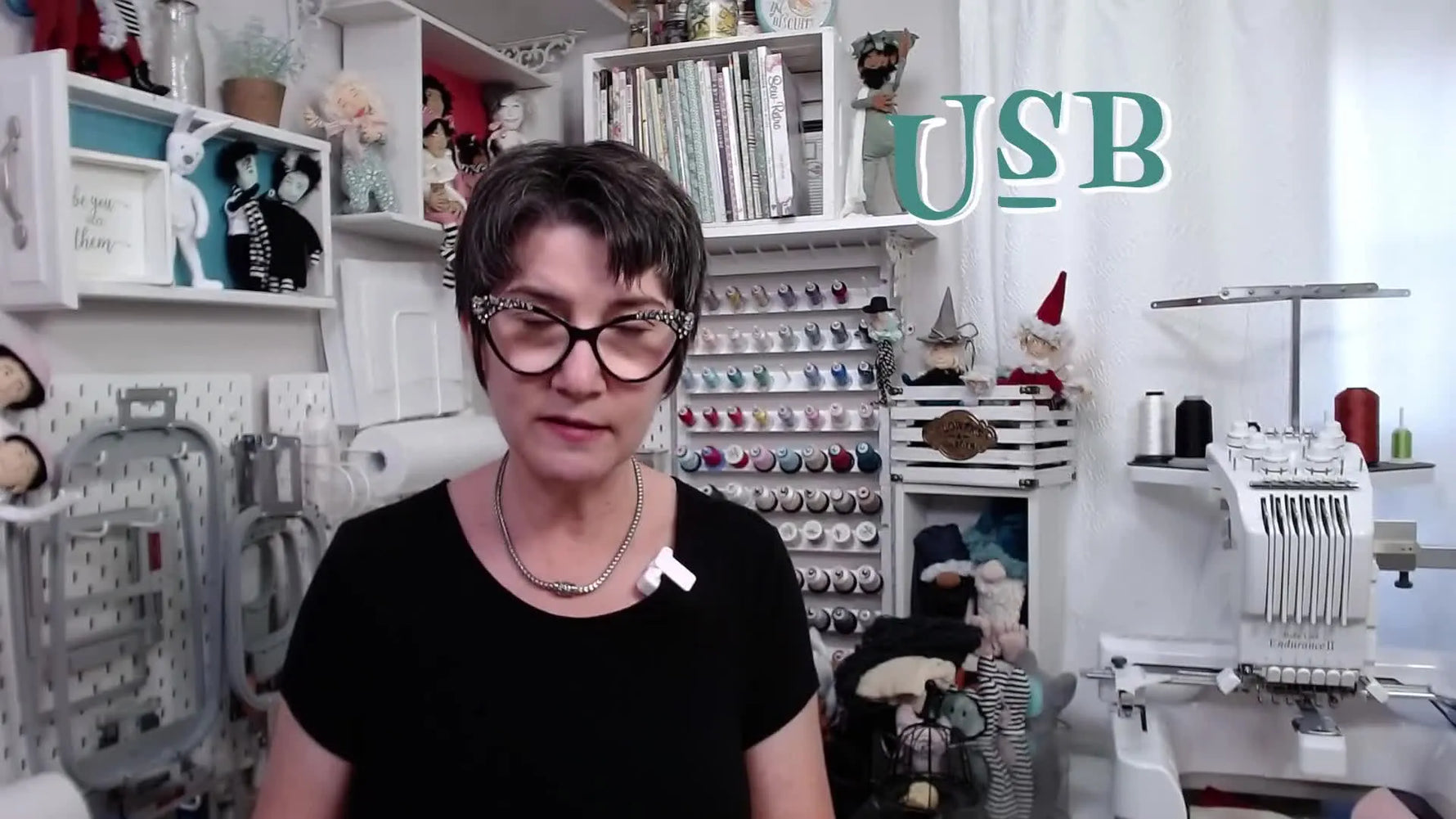 A close-up of a USB connector with a black insert labeled USB 2.0, showing the visual cue most embroidery machines need for compatibility.