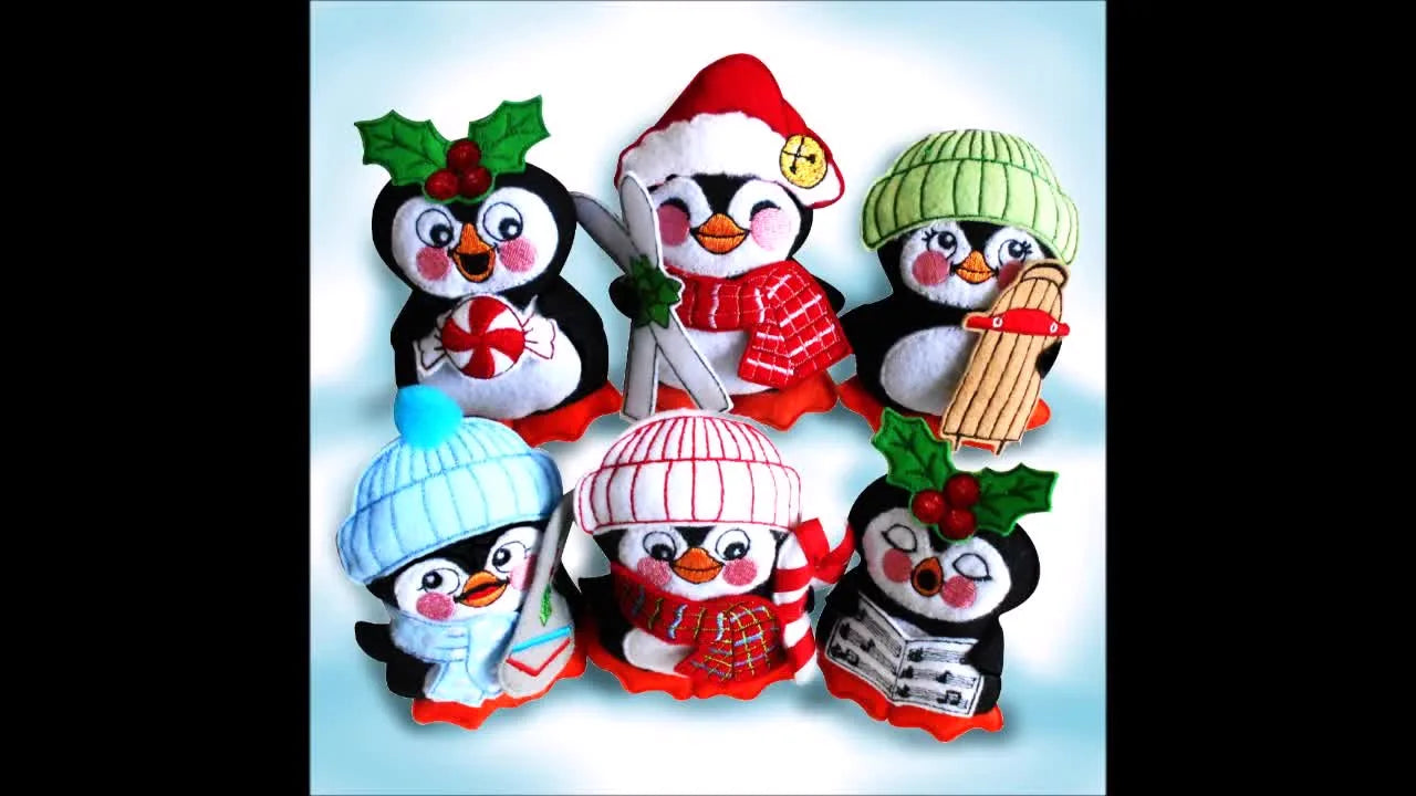 An overhead view showing the finished felt penguin wreath alongside individual penguin treat bags, highlighting the final look you’re aiming for.