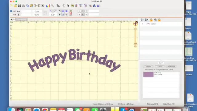A screen capture of Embrilliance Essentials showing “Happy Birthday” typed and displayed as a curved arc on the hoop grid.