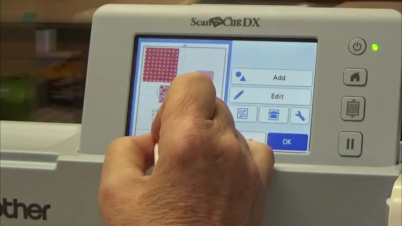 A close-up of the ScanNCut screen shows a vector cut line being dragged to perfectly align over the scanned fabric background for precise appliqué cutting.