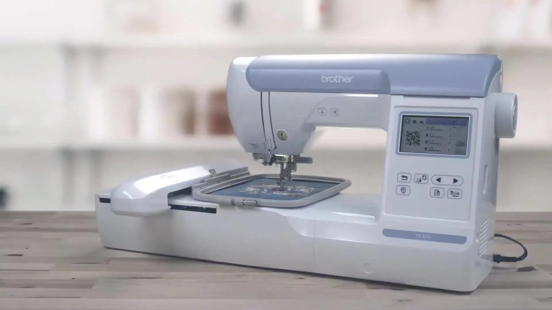 A clean studio shot of the Brother PE800 on a white background, highlighting its compact home-embroidery form factor.
