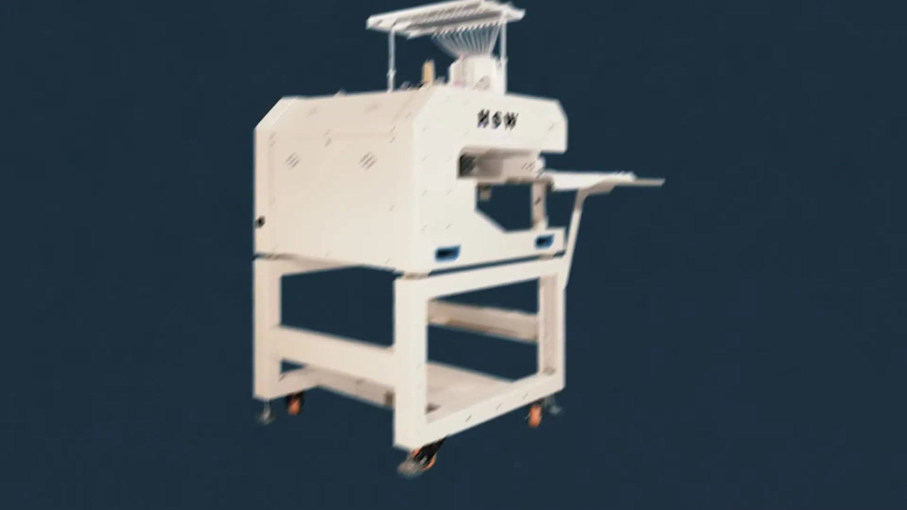 A full front view of the HSW 5G embroidery machine on its stand with the touchscreen illuminated, ready for production.