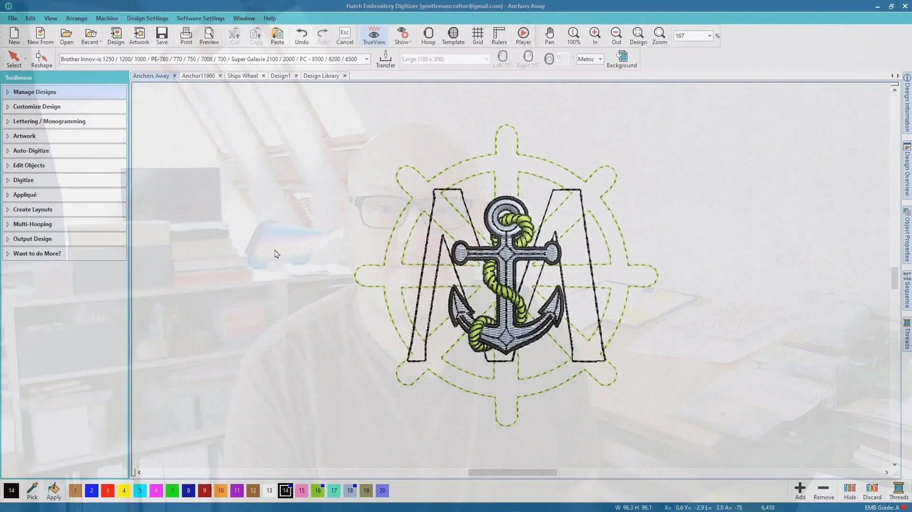 Hatch Embroidery software showing the finished combined emblem on a grid: anchor and M over a ship’s wheel.