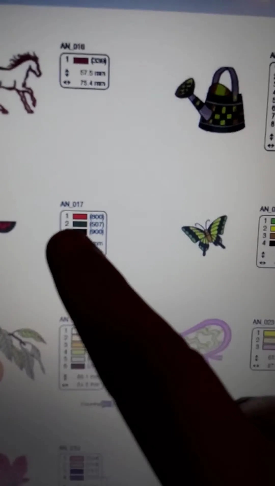 A close-up of the PDF catalog’s technical chart highlighting the tiny watermelon design dimensions, helping you judge size before you stitch.