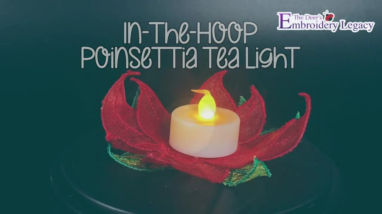 A finished organza poinsettia tea light holder glows from within, showing crisp heat-sealed edges and dimensional petals.