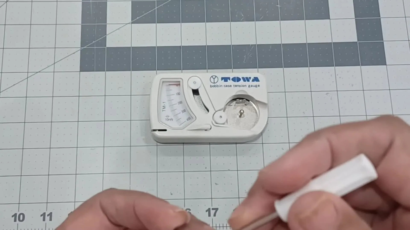 Ricoma EM1010 Bobbin Tension with a Towa TM-1: The Calm, Repeatable Fix for Wavy Satin and “No White Line” Backs