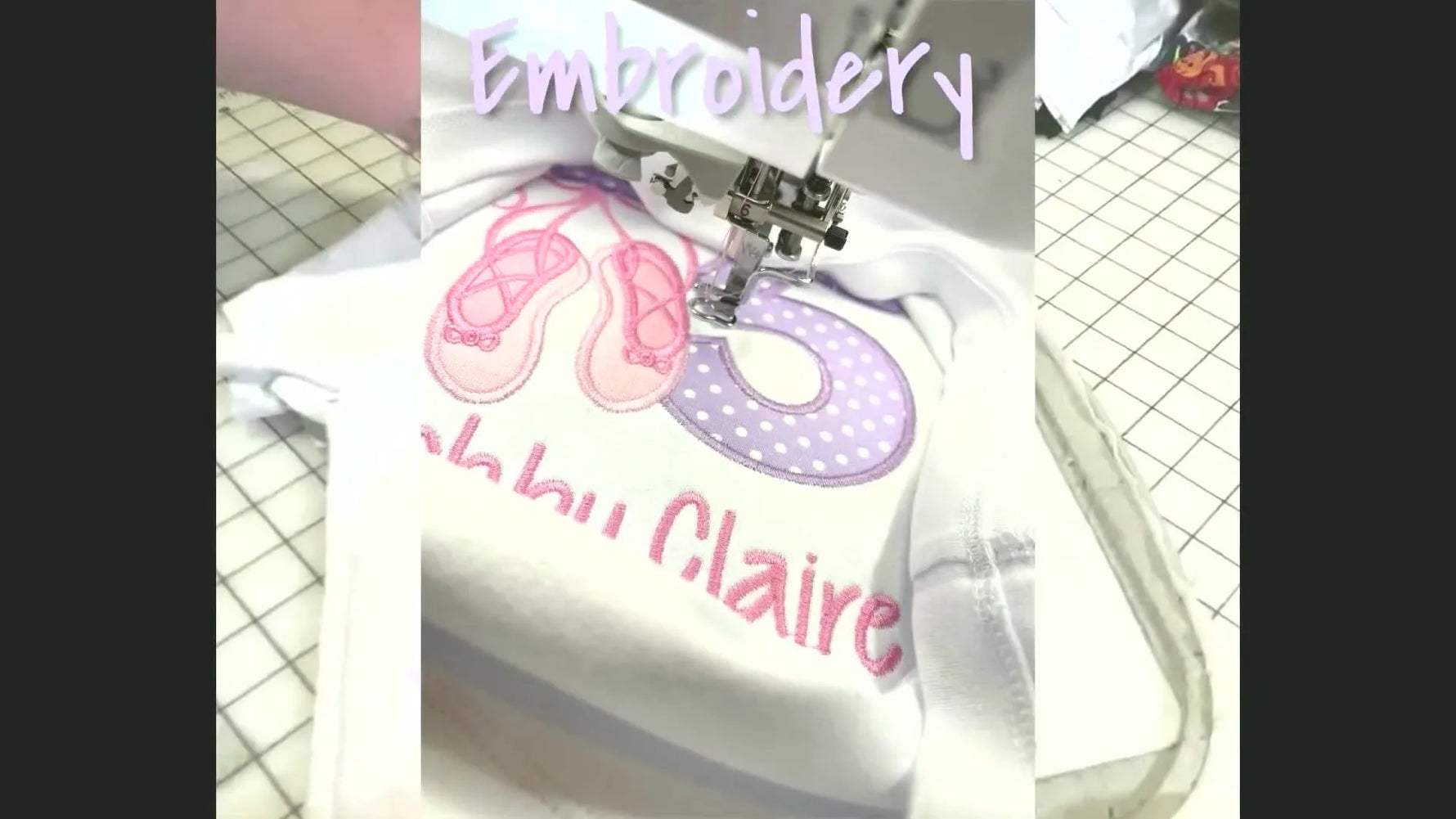 An embroidery machine stitching a ballet slipper design onto a white garment.