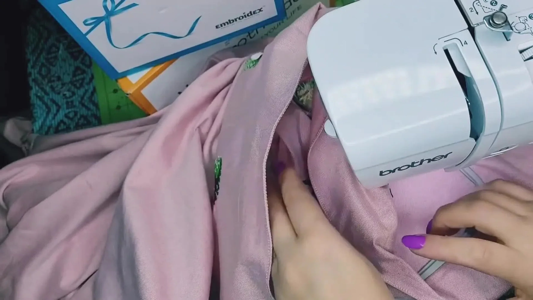 Embroidery machine starting to stitch the outline of the flamingo design.